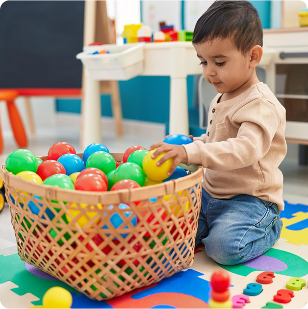 Kid playing with balls